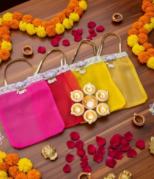 lotus motif tissue organza bag & 7 inch diya urli combo | festive gift set for diwali & pooja